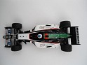 1:43 Minichamps Minardi PS04B 2004 Black W/White & Green Stripes. Uploaded by indexqwest